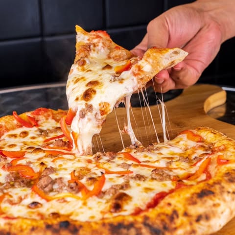ROSSI'S PIZZA AND SMOKED MEATS LIMITED logo